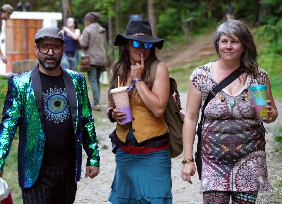 Various ValhallaFest moments with attendees, performances, workshops, and scenic forest views.