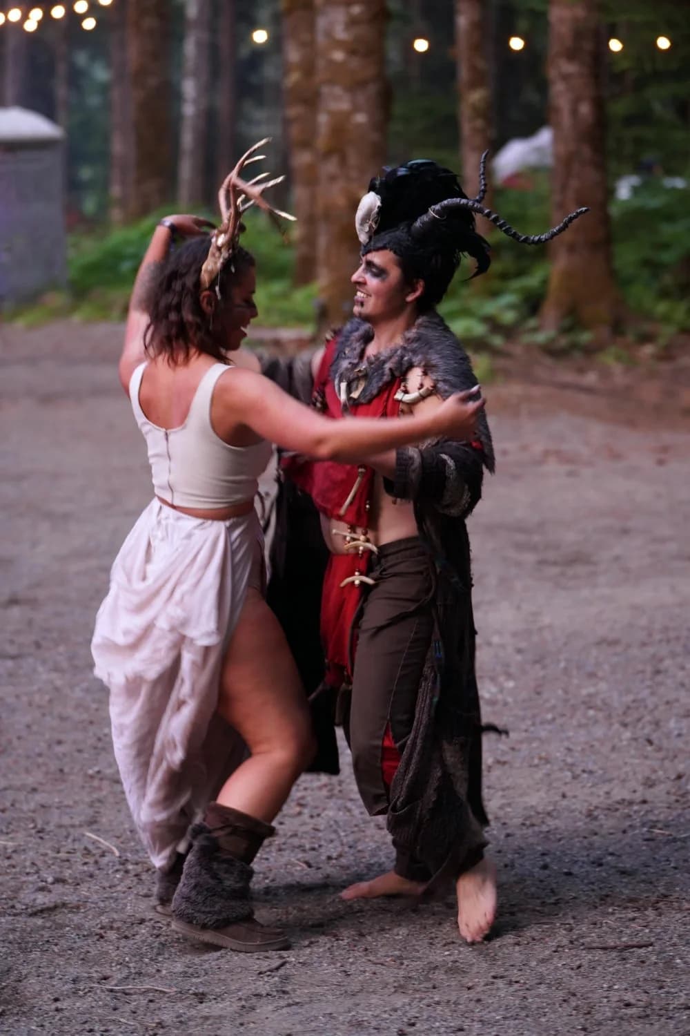 Various ValhallaFest moments with attendees, performances, workshops, and scenic forest views.