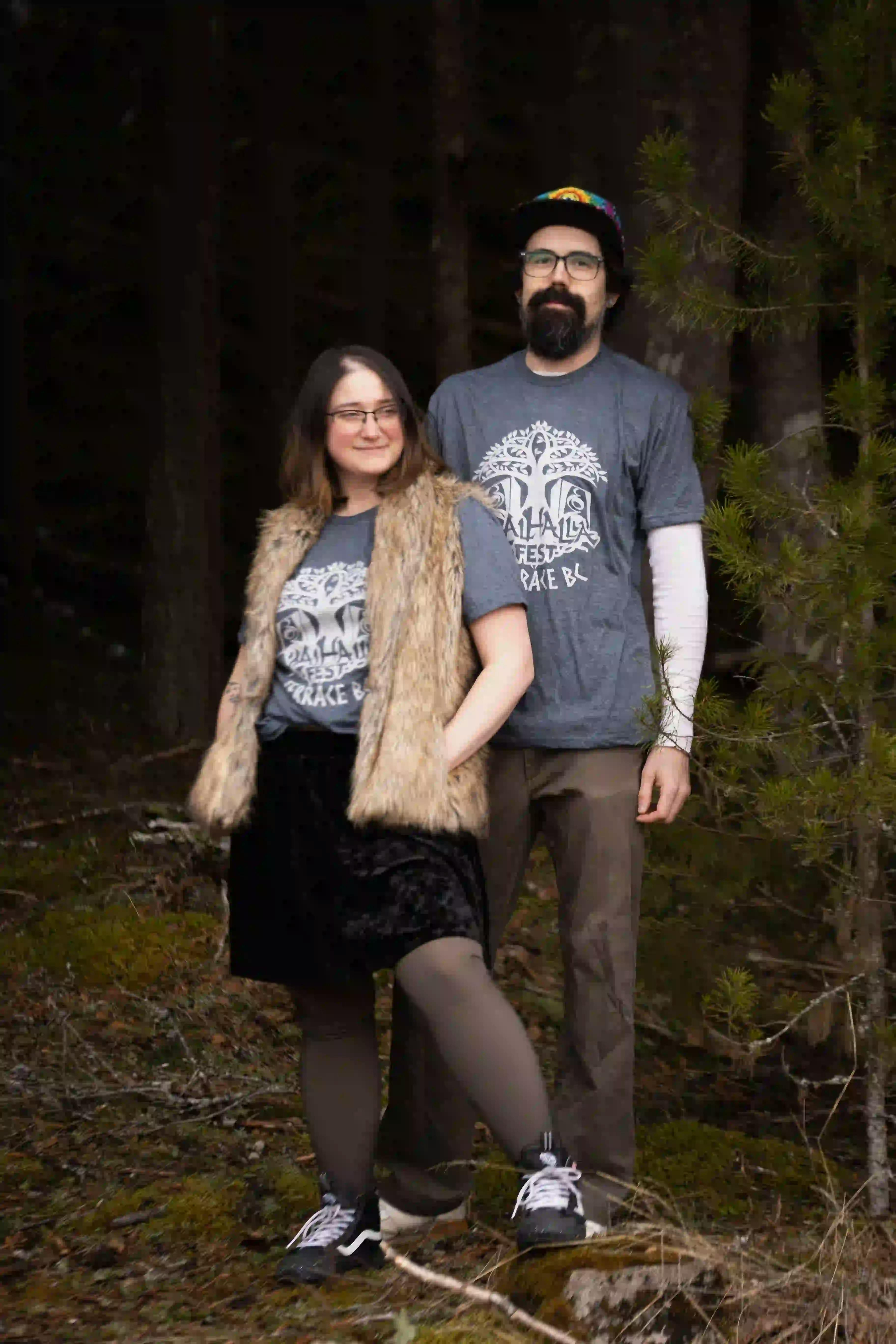Couple in forest with ValhallaFest t-shirts.